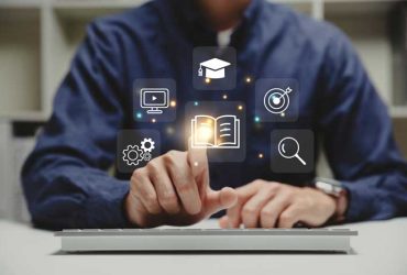 E-learning and online education concept, Webinar, teaching, online training, Young man pointiing to education icon.